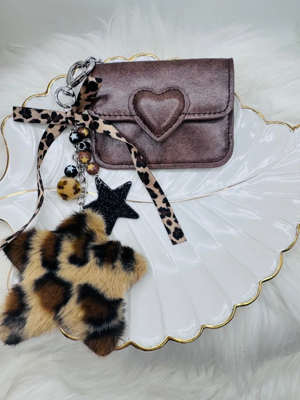 Elevate your everyday essentials with this chic brown card case keychain set. Fe